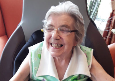 Smiling lady resident at Hengist Field Care Home