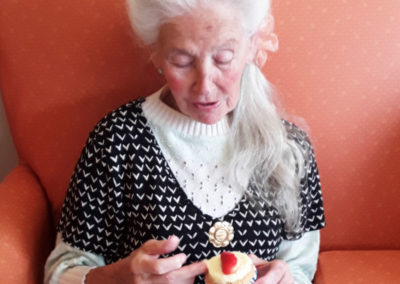 Lady resident with a cupcake