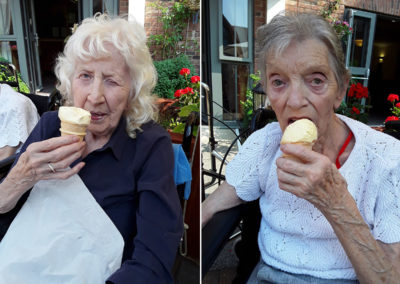Two lady residents eating ice-creams in the garden