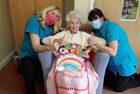 Hengist Field Care Home resident Eileen in May 2020 with Jackie and Debbie from the Activities Team