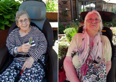 Two female Hengist Field Care Home residents in the garden