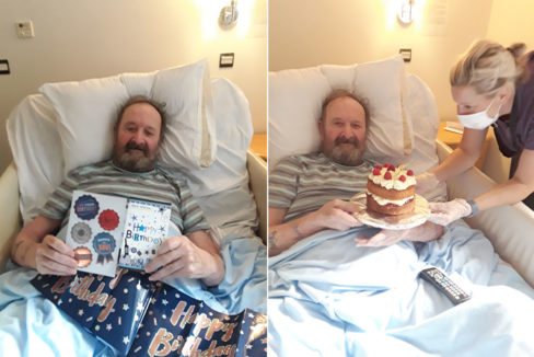 Resident with his birthday cards and cake at Hengist Field Care Home