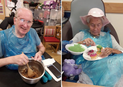 Hengist Field Care Home residents mixing chocolate and icing cupcakes