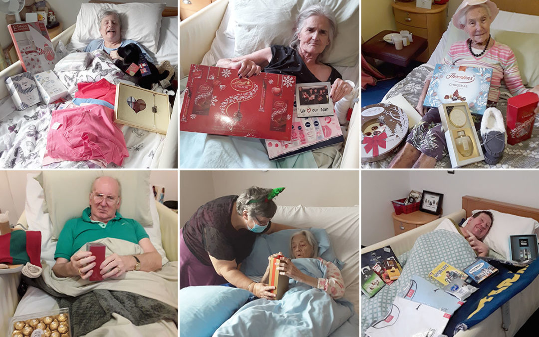 Opening Christmas gifts at Hengist Field Care Home