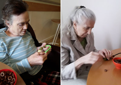 Hengist Field Care Home residents making pipe cleaner bird feeders