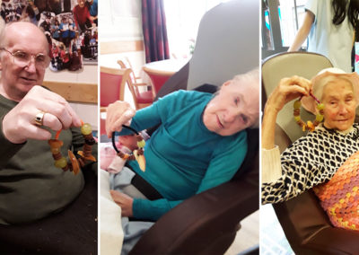 Hengist Field Care Home residents with their finished handmade bird feeders