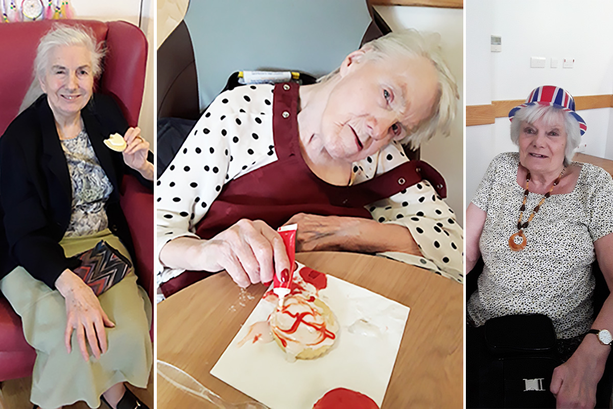 Resident decorating a biscuit and others having fun on St Geroge's Day at Hengist Field Care Home