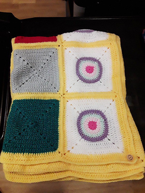 Crocheted blanket donated to Hengist Field Care Home