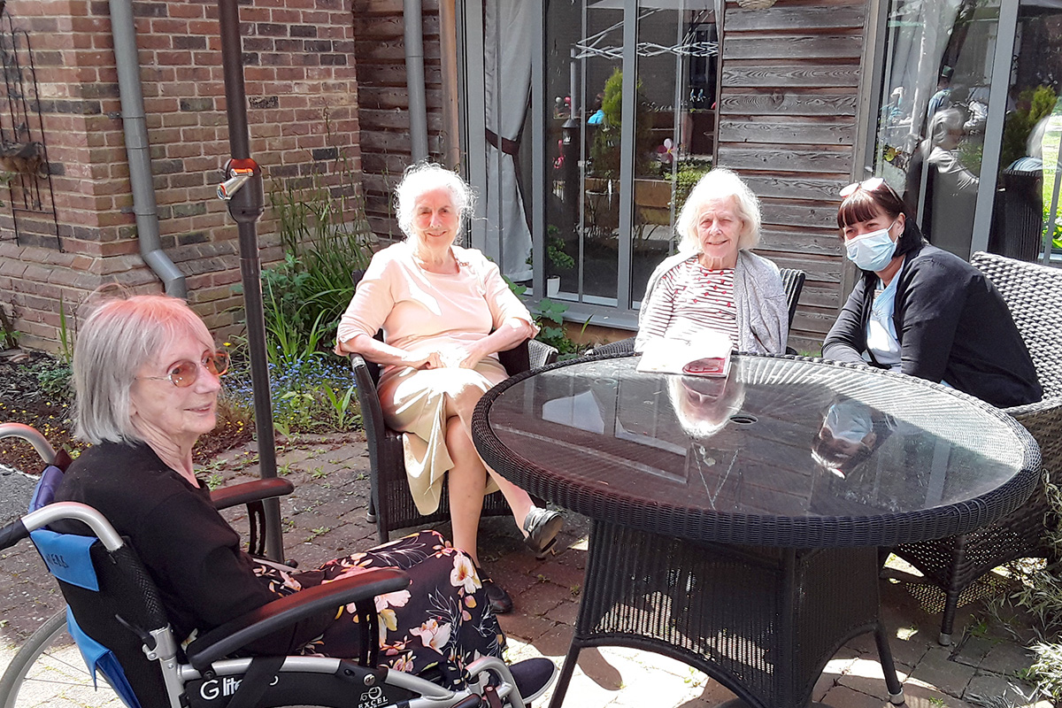 Hengist Field Care Home residents enjoying sunshine in their garden