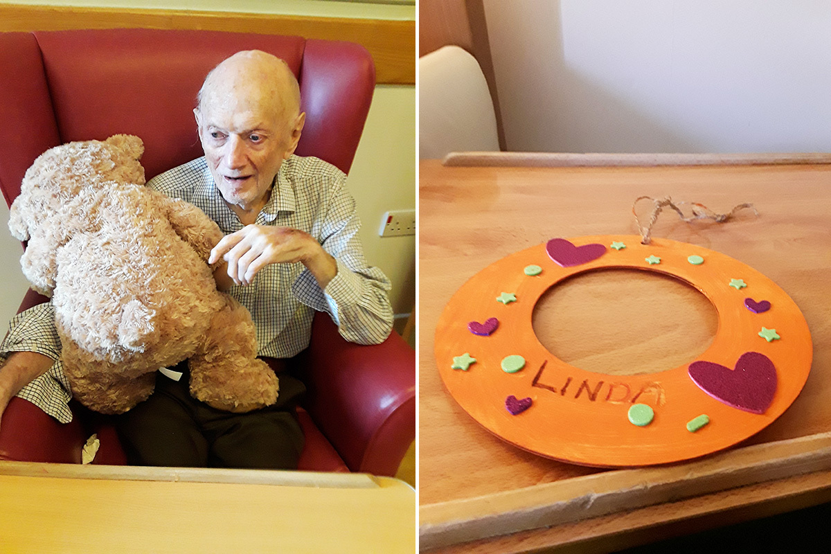 Teddy bear cuddle and homemade decoration at Hengist Field Care Home