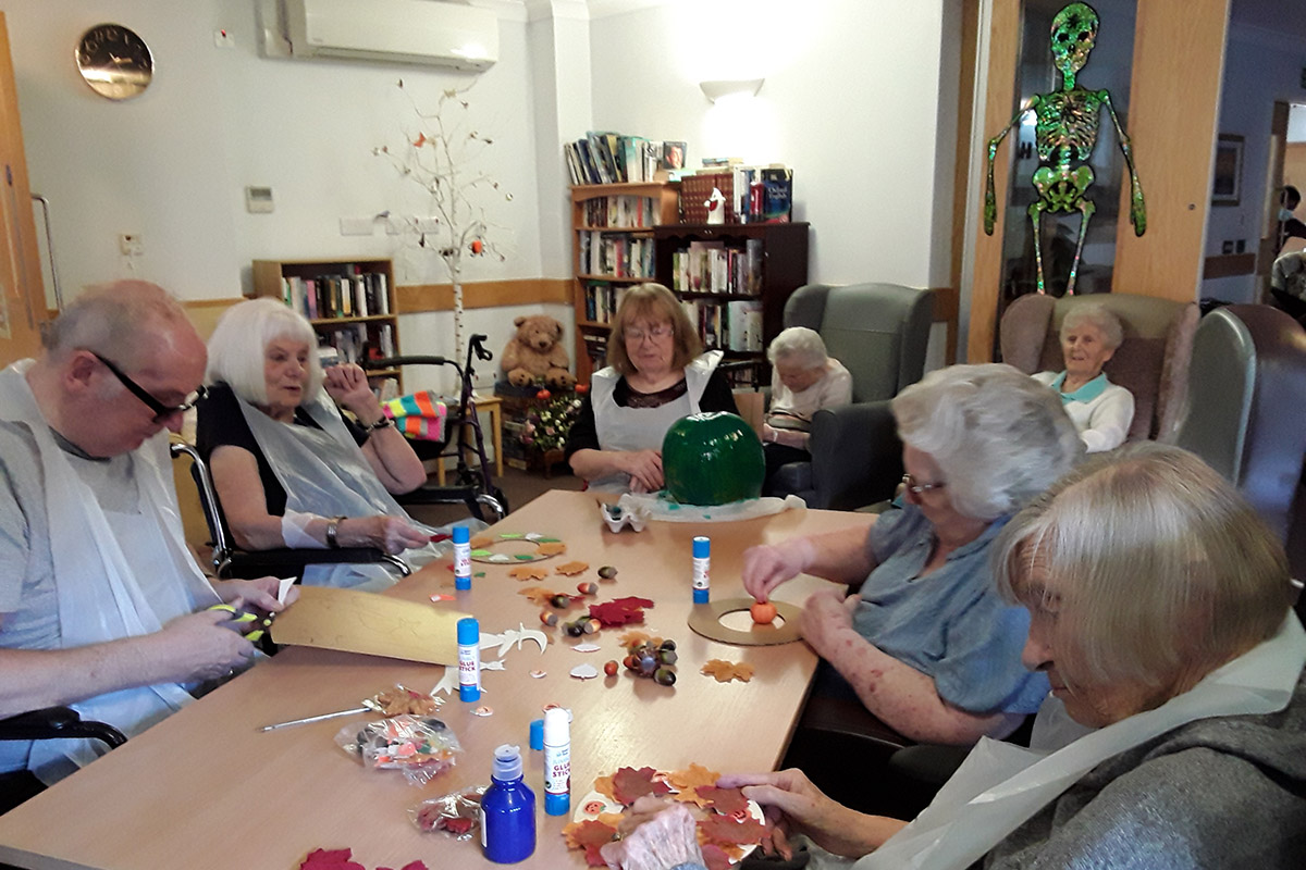Making Halloween decorations at Hengist Field Care Home