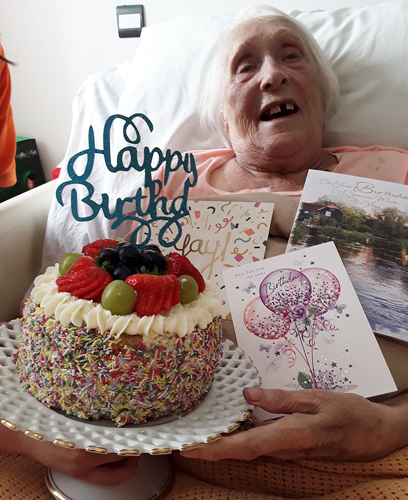 Audrey with her birthday cake at Hengist Field Care Home