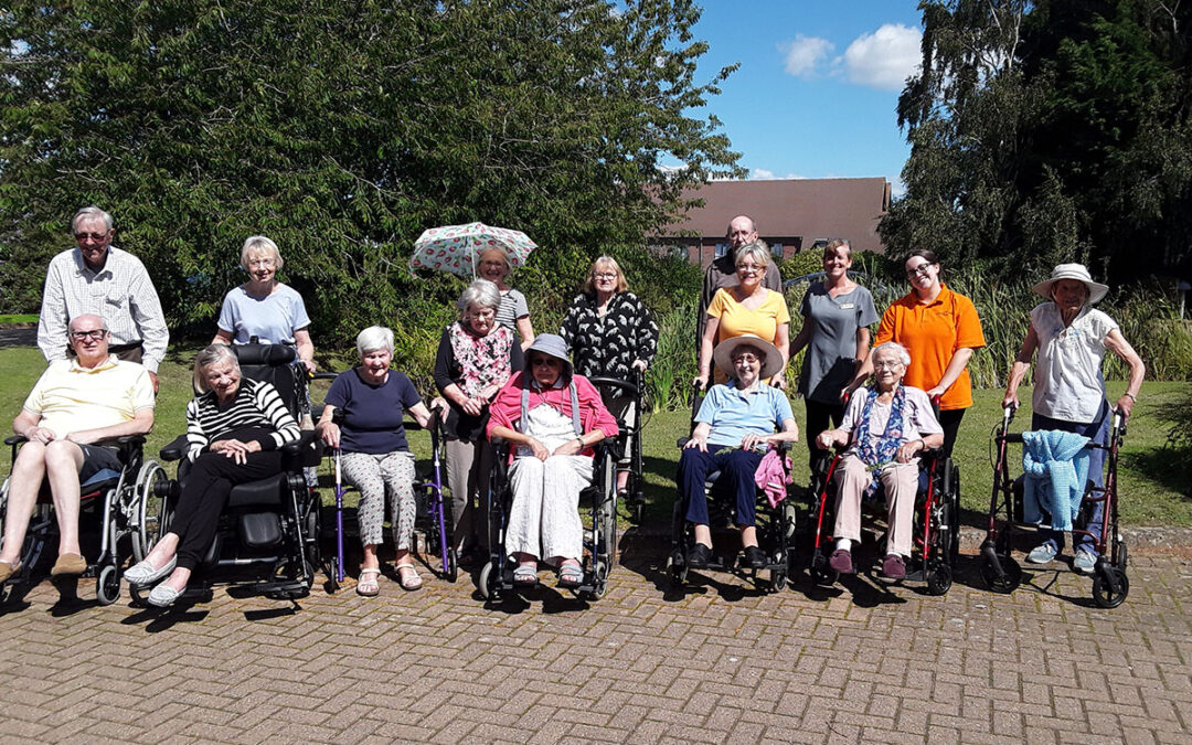 Hengist Field Care Home residents and staff enjoy a sunny morning stroll