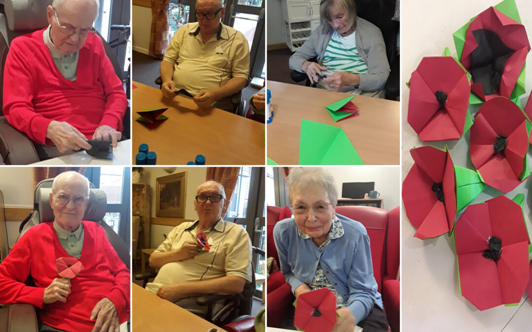 Making origami poppies at Hengist Field Care Home
